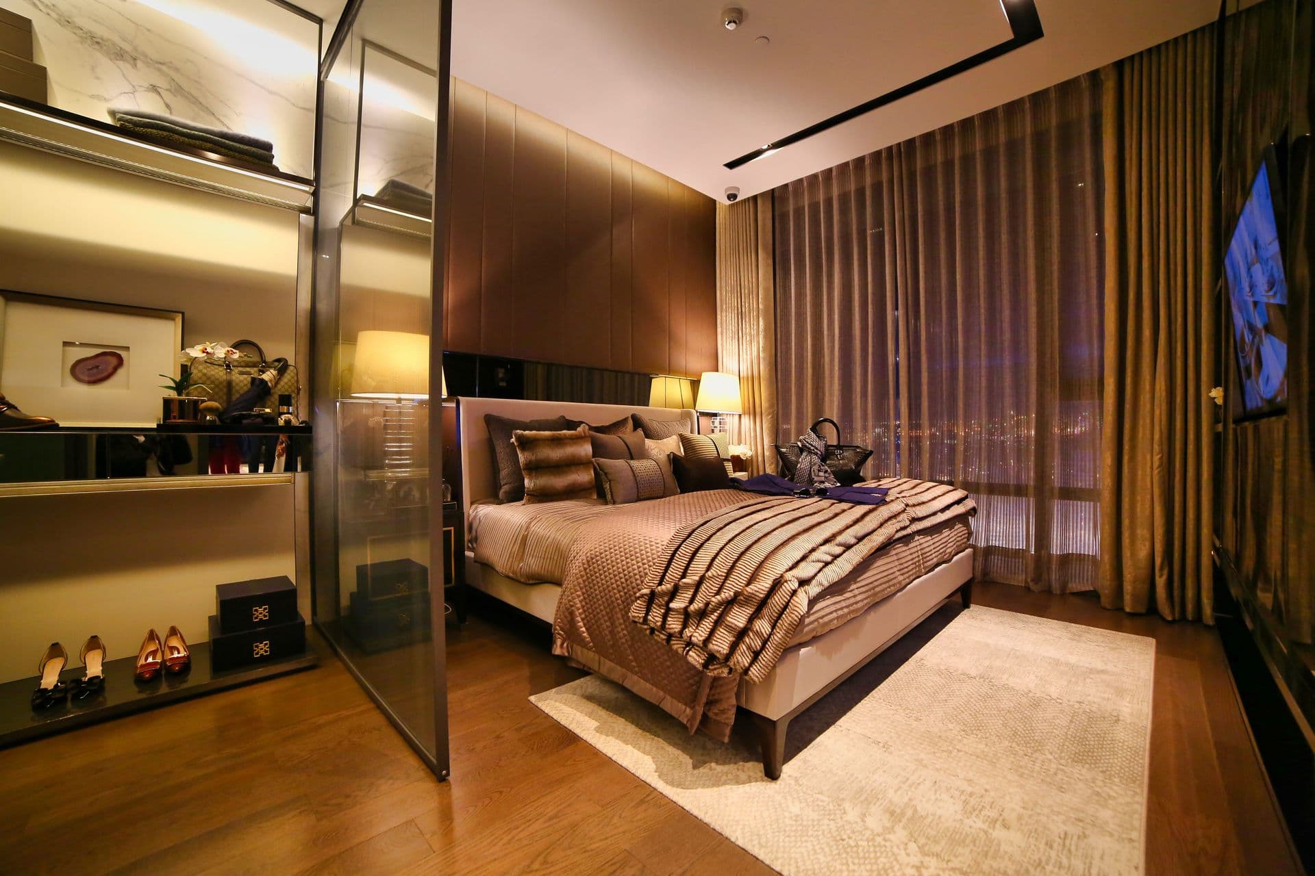 A sea-facing suite lounge with soft furnishings at golden hour